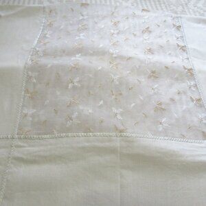 White linen tablecloth with sheer center with embroidered accents 82x60"